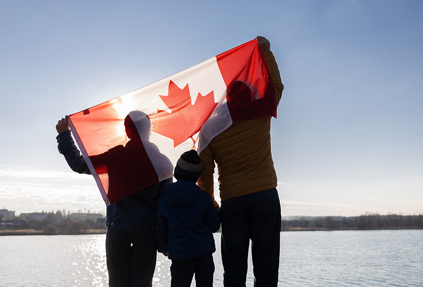 Family with Canadian flag image